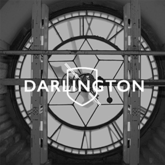 Image of Clock Face with Ingenious Darlington Logo